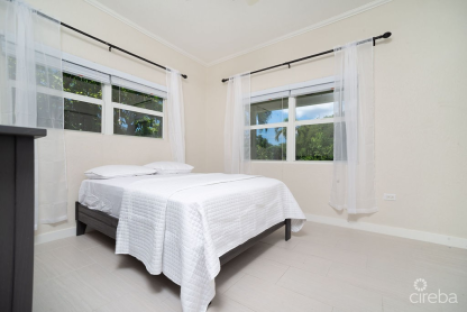 Beautifully Renovated 3Bed Home With Den + Income Producing 1 Bed Apartment