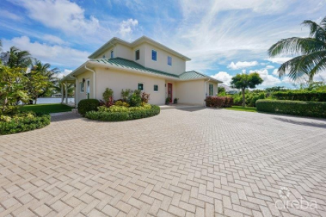 Unique Patrick’s Island Canal Front Home With Guest House And 3 Car Garage - Soon To Be Gated!