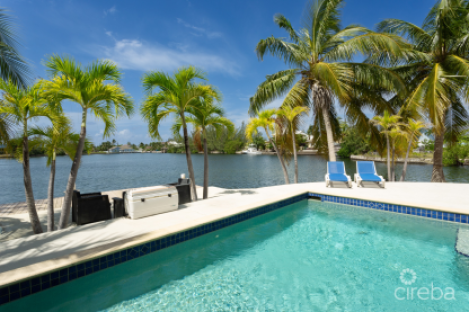 Canal Front Home On Open Water Basin