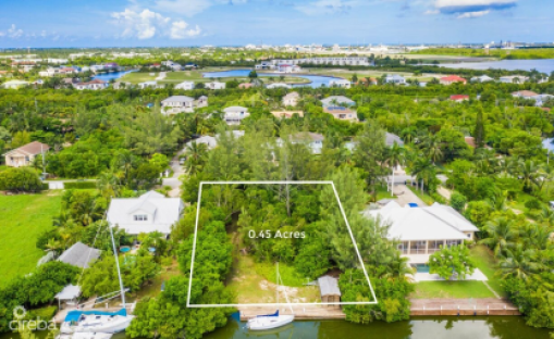 Canal Front .45Acre W/Dock