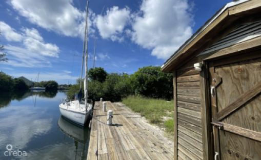 Canal Front .45Acre W/Dock