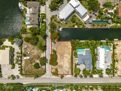 RARE CORNER WATERFRONT PARCEL IN THE YACHT CLUB